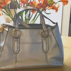 Aimee Kestenberg metallic silver top handle/long strap bag with gold hardware